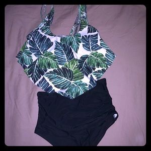 Bikini with high waist bottoms.